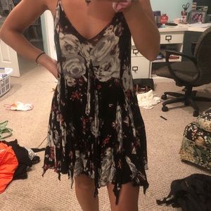 Black dress with pink, red, and white design.